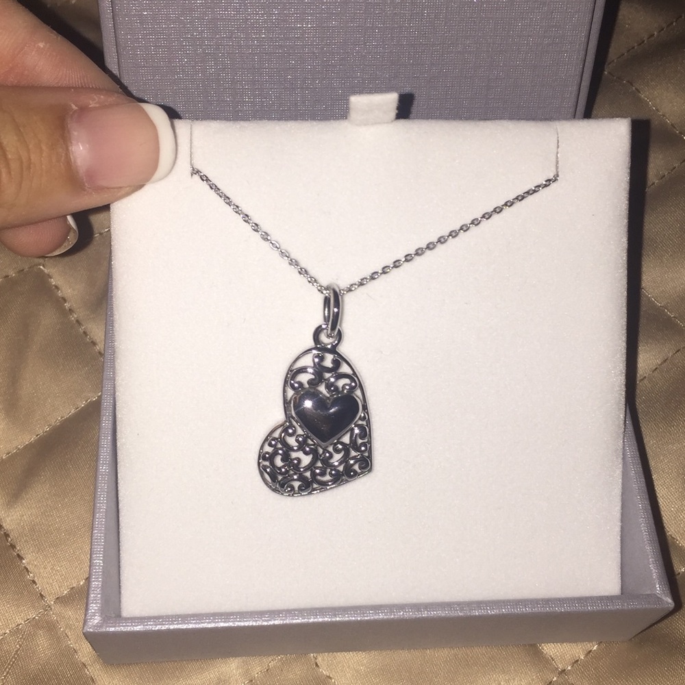 Never worn before heart necklace.